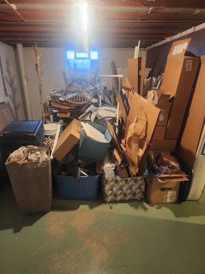 Roll-off dumpster container at job site for 8 Yard Dumpster Rental in Apple Valley